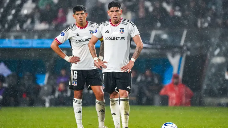 Carlos Palacios y un alocado festejo con Esteban Pavez.