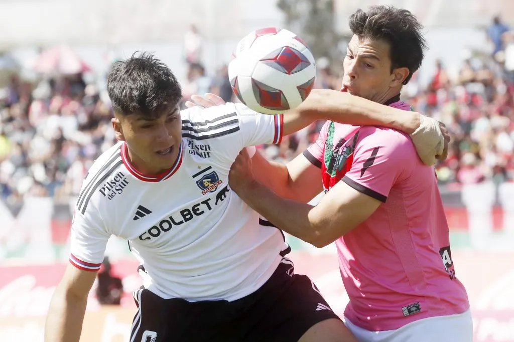 Damián Pizarro con Fernando Meza. (Foto: Photosport)