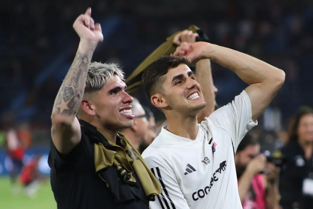 Carlos Palacios junto a Bruno Gutiérrez. (Foto: Photosport)