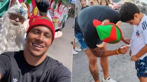 Brayan Cortés se viste de Viejo Pascuero y reparte regalos navideños en Iquique.