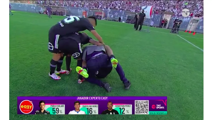 Morales con Quinteros en pleno festejo.