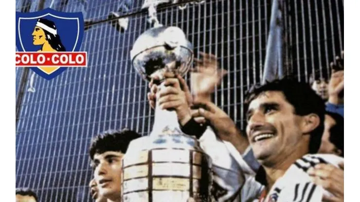 Rubén Espinoza junto a Miguel Ramírez levantando la copa