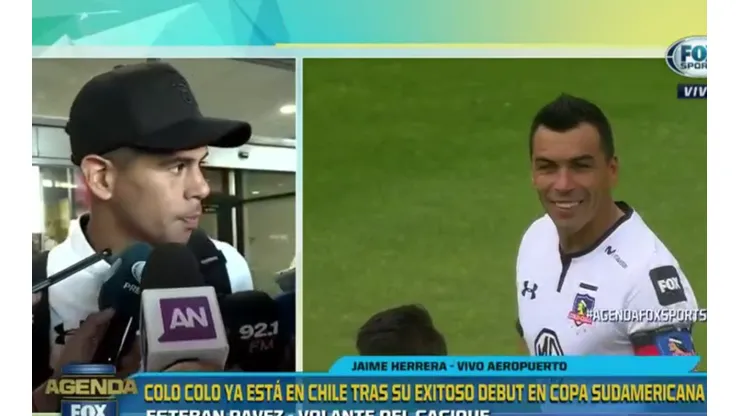 Esteban Pavez hablando de Paredes en el aeropuerto.