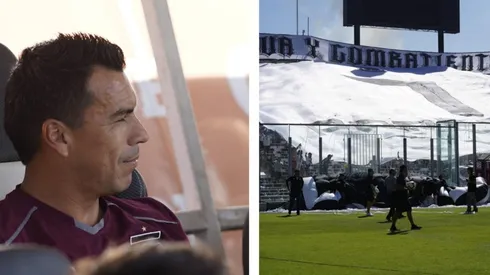Esteban Paredes observando la bandera gigante.