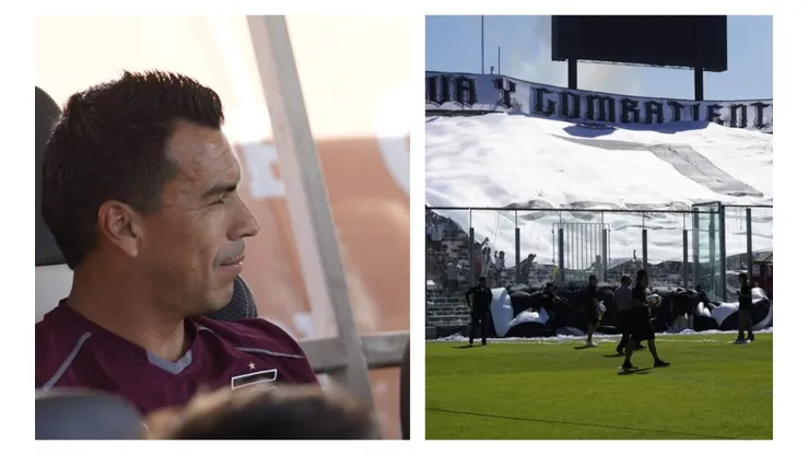 Esteban Paredes observando la bandera gigante.
