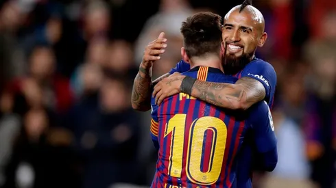 Arturo Vidal y Lionel Messi