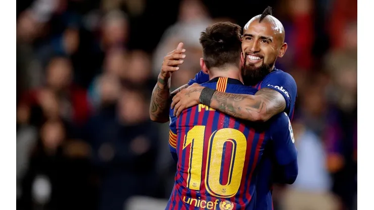 Arturo Vidal y Lionel Messi