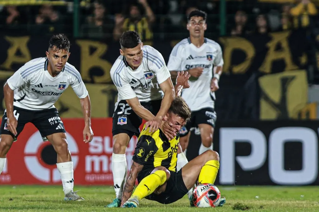 Lucas Cepeda y Vicente Pizarro en el partido frente a Peñarol. (Foto: Photosport)